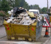 an overfilled skip image: snowmanradio CCBY-SA 3.0
